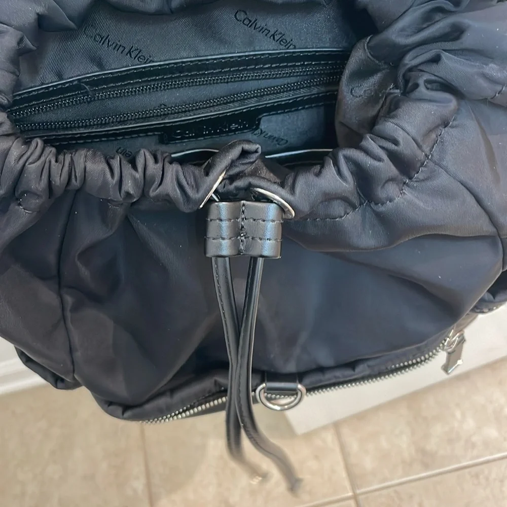 CALVIN KLEIN // black fashion backpack // fold over // TONS of zipper pockets - Picture 14 of 16